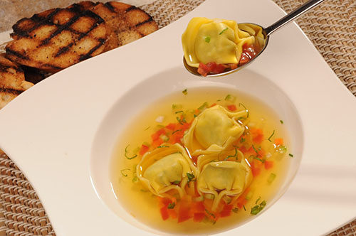 Chicken and Prosciutto Tortelloni with Consommé