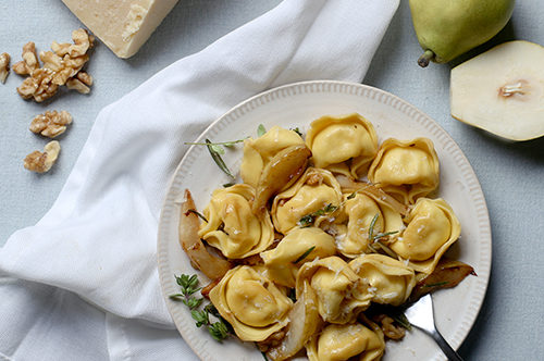 Cheese Tortelloni with Caramelized Pears, Roasted Walnuts, and Herbs