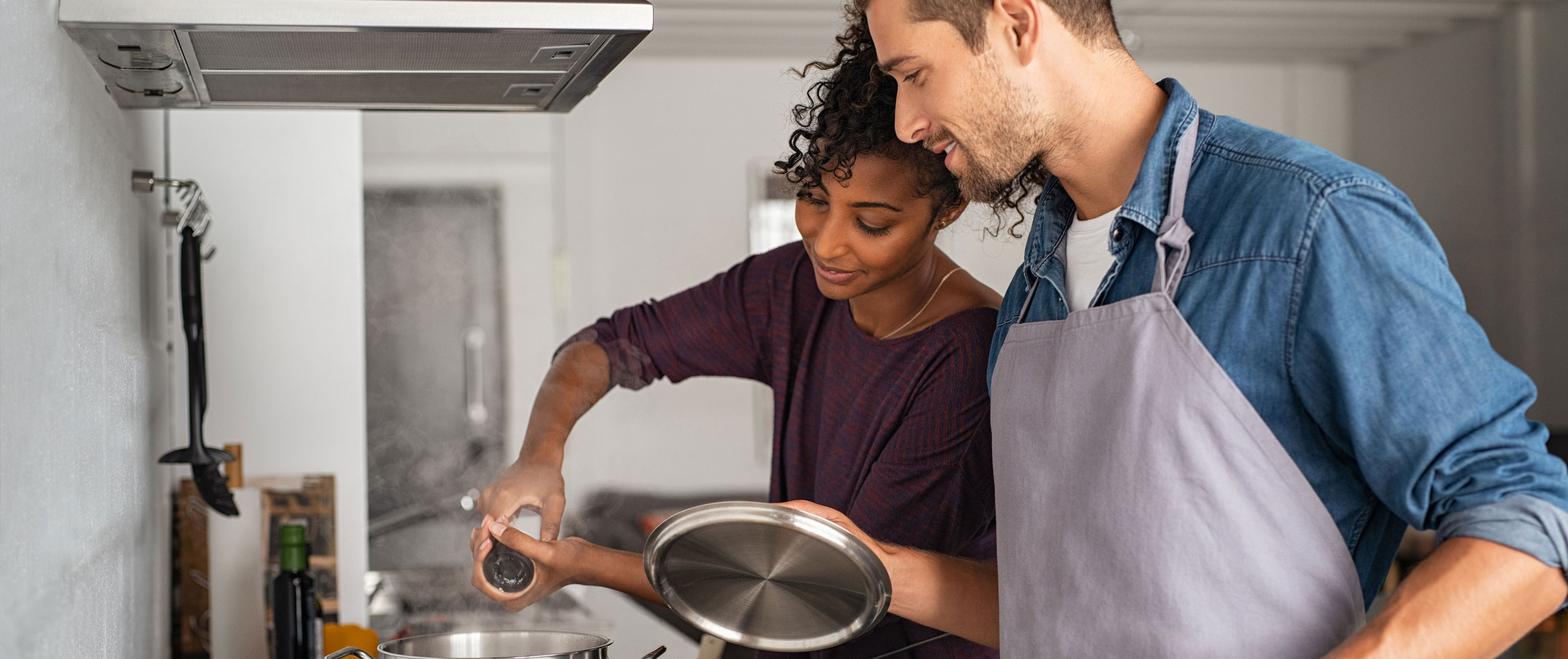 a couple cooking at home